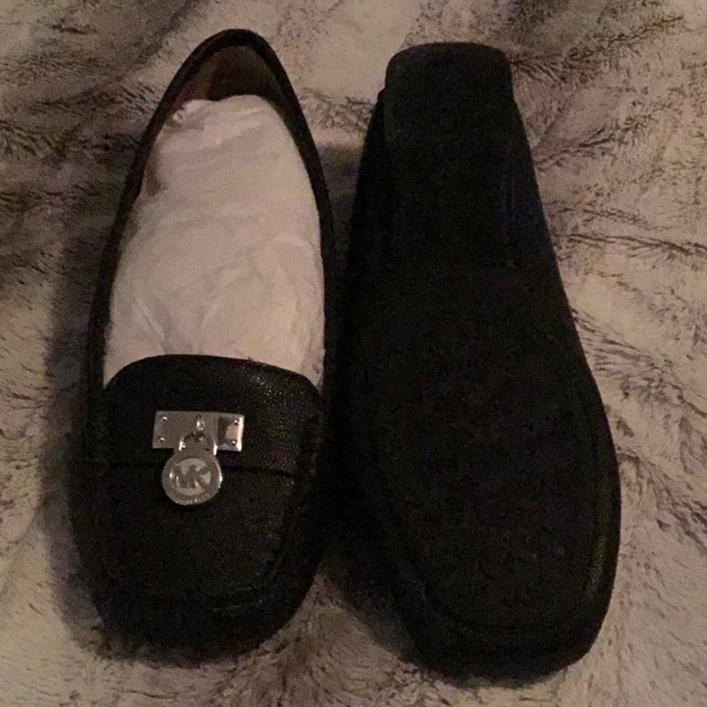 Pair black Micheal Kors penny lofters